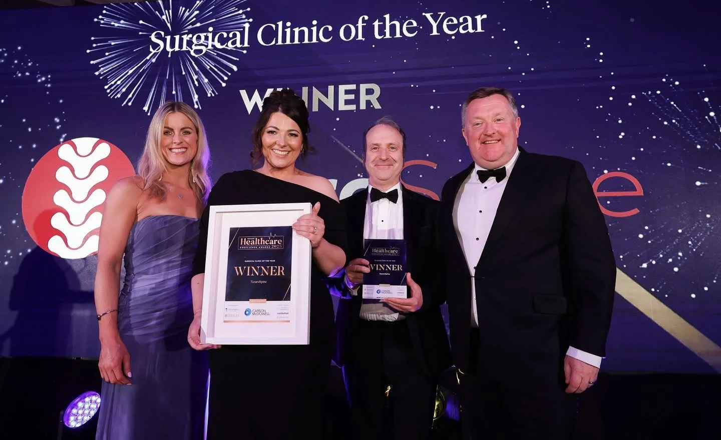 Team collecting the award